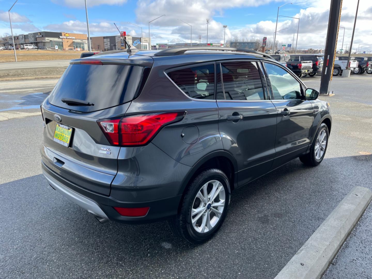 2019 GRAY /black leather FORD ESCAPE SEL (1FMCU9HD5KU) with an 1.5L engine, Automatic transmission, located at 1960 Industrial Drive, Wasilla, 99654, (907) 274-2277, 61.573475, -149.400146 - Photo#4